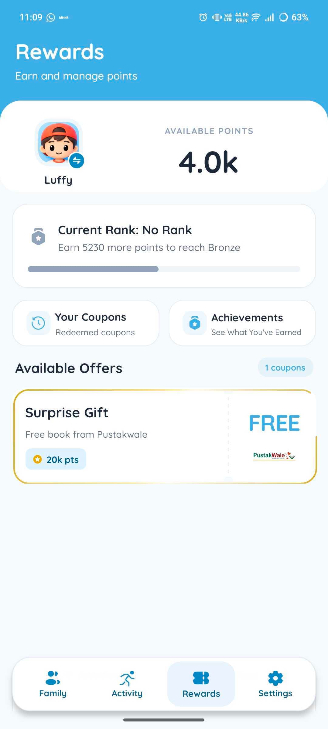 Rewards screen showing points, rank progress and an offer to redeem